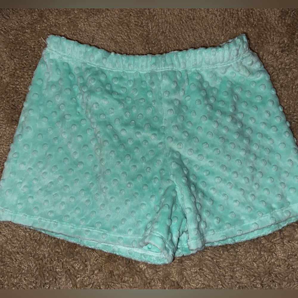 The cutest and softest pj shorts in a teal color. Never worn before. Polka dots.